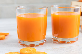 Glasses of carrot juice.