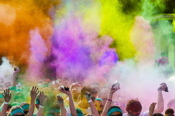 People are covered in colors.