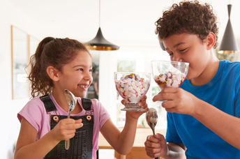 Enjoying a bowl of homemade vegan ice cream.
