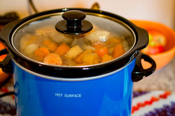 Cooking a stew in a slow cooker.