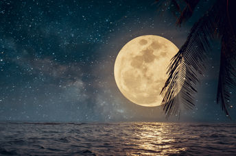 Full moon on a tropical beach.