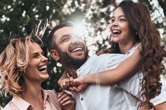 Happy family enjoying nature.