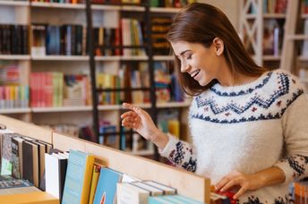 Choosing a book at a community bookseller.