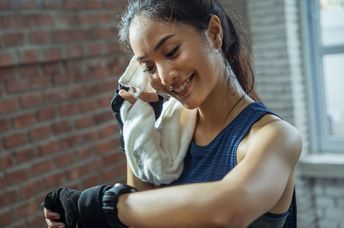 Woman athlete working up a sweat.