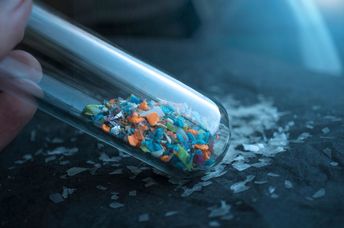 Water samples containing microplastics.