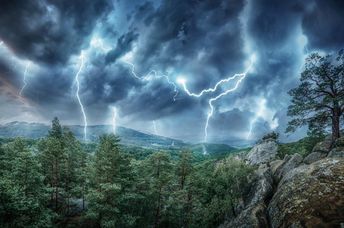 Lightning strikes in the mountains.