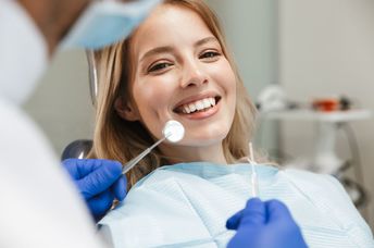 Woman who is no longer experiencing sensitive teeth.