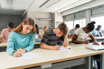 Students taking an exam.