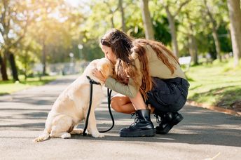 A woman with her dog.