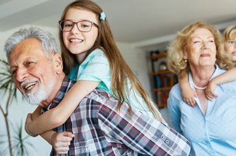 Grandparents watching their grandchildren.