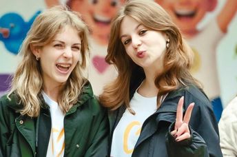 Two young volunteers at the RVC Center in Moldova.