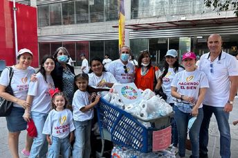Volunteers gather with supplies during a Good Deeds Day community activity in Mexico.