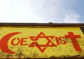 Coexist sign in Bristol, UK