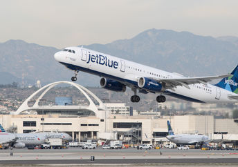 The official Flying it Forward luggage tag.