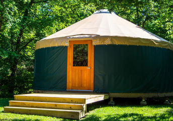 A yurt in the woods.