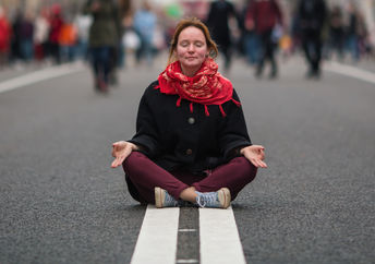 Meditating on a busy street