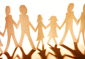 Paper cutouts of family and community