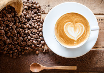 Coffee cup and beans.