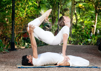 Reap the health benefits of yoga for two.