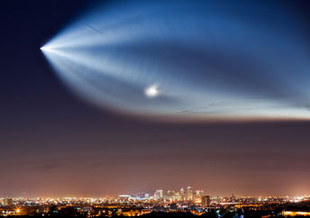 The SpaceX Falcon 9 rocket, as seen on an earlier journey over downtown Phoenix.