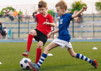Kids playing sports.