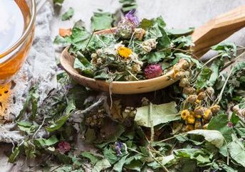Dried herbs and flowers used to prepare herbal teas.