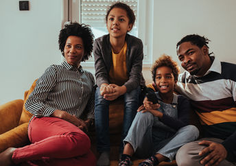 a family watching a movie together during Black History Month.