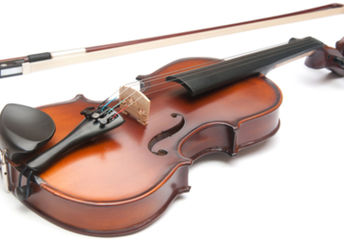 A violin and a bow on a white background.