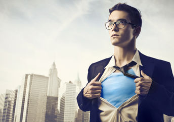 Superhero Batman looking down at Gotham.