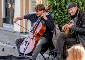 Musicians performing outdoors.