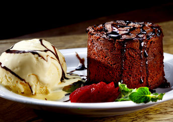 Mouthwatering vanilla ice cream and chocolate cake