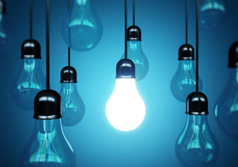 Idea concept with light bulbs to show inspiring innovation.