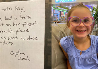 Lena and the note for the tooth fairy.