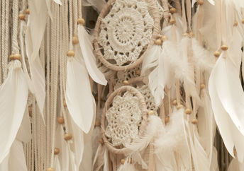 Knitted white dream catchers.