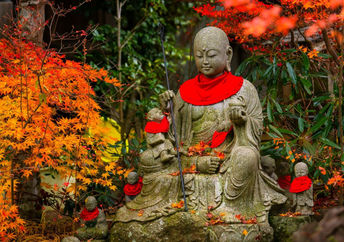 Jizo statue in autumn garden of Sanboin Temple on Mount Koyasan.