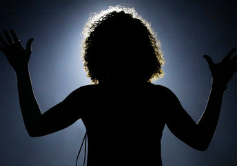 Silhouette of a woman.