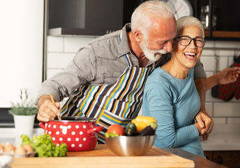 Couple preparing a healthy meal together in the kitchen