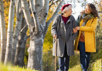 Being kind to an older neighbor.