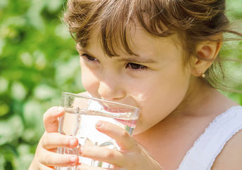 Drinking a glass of water pulled from the air.