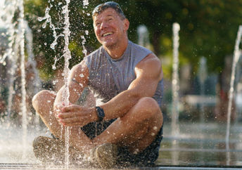 Cooling off in a city fountain.