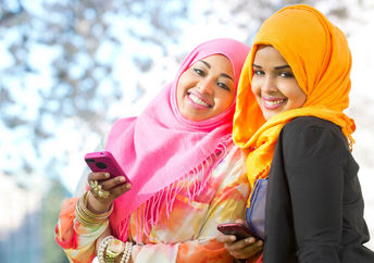 Two young Somali women using an app.