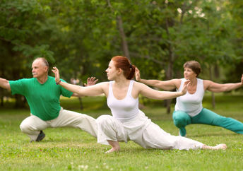 Practicing qigong in a park.