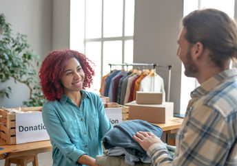Giving to a clothing drive.