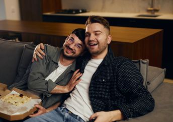 A couple watching a movie together.