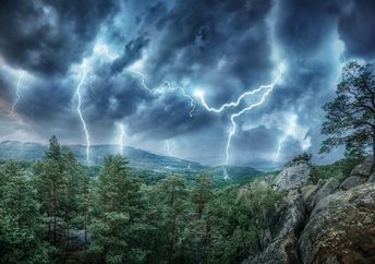Lightning strikes in the mountains.