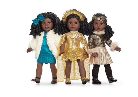 This American Girl Doll is dressed in three designer 1920s outfits.