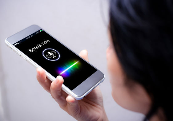 Using a  voice to synthesized speech platform on a smartphone.