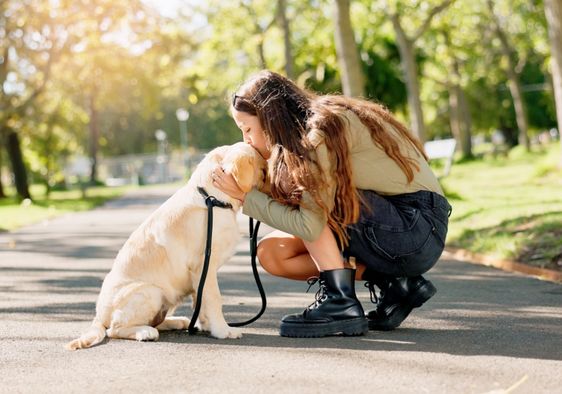A woman with her dog.