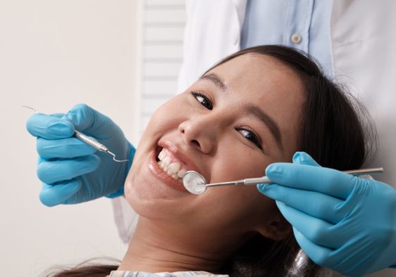 A woman at a dental appointment.