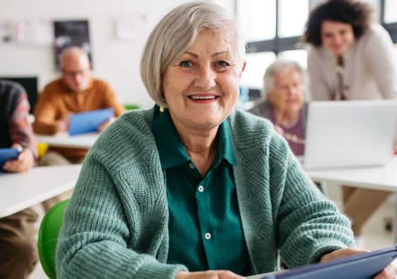 Seniors learning through hands-on activities.